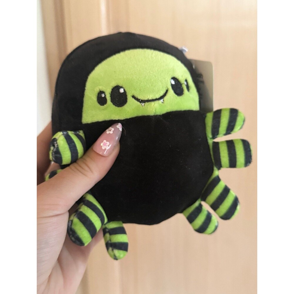Adorable green and black spider push